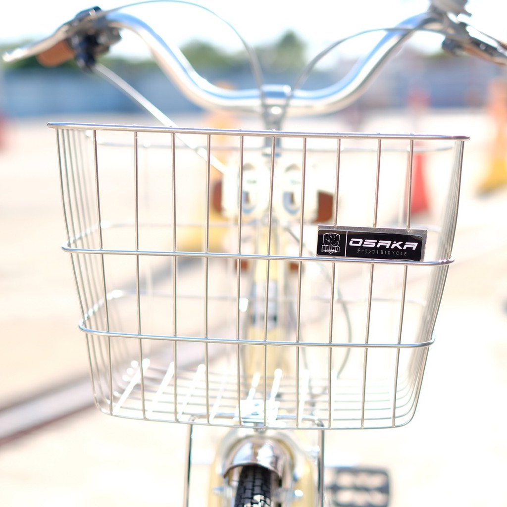ภาพหน้าปกสินค้าOSAKA จักรยานแม่บ้าน ตะกร้าสแตนเลส เกียร์ SHIMANO 7 สปีดรุ่น RHINO XT 24/26 จากร้าน jimmycomegood บน Shopee