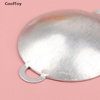 ภาพหน้าปกสินค้าCooltoy โมเดลกระทะโลหะจิ๋ว 1/12 สําหรับตกแต่งบ้านตุ๊กตา ที่เกี่ยวข้อง