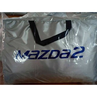 ภาพหน้าปกสินค้าผ้าคลุมรถซิลเวอร์โค๊ต (แบบหนา) MAZDA 2 5 D แถมฟรี! ม่านบังแดด ที่เกี่ยวข้อง