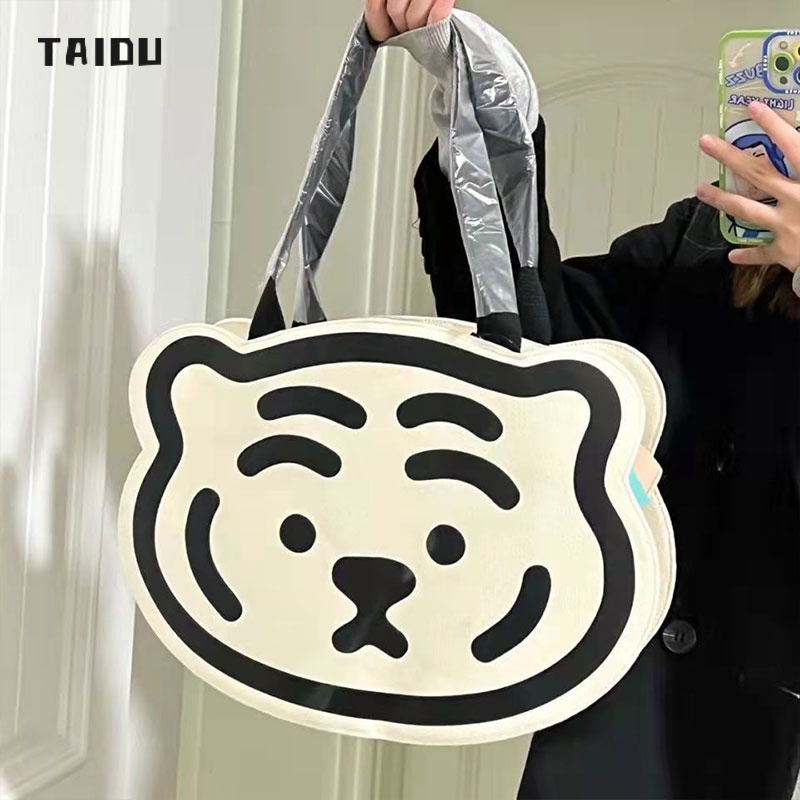 รูปภาพของTAIDU กระเป๋าผ้าใบ สไตล์เกาหลี ใหม่ อเนกประสงค์ ถุงสิริ กระเป๋าคาดหัวเสือลองเช็คราคา