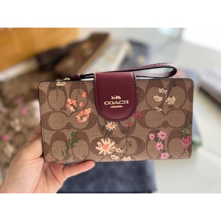 (ผ่อน0% กระเป๋าสตางค์ใบกลาง TECH WALLET IN SIGNATURE CANVAS WITH WILDFLOWER PRINT (COACH C8729) ลายซีสีน้ำตาล ลายดอกไม้