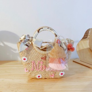 New!! กระเป๋าสานทรงคางหมู โทนสีชมพู น่ารัก แบบถือหูกลม แต่งพู่ แต่งชื่อ (กระเป๋า Handmade สานผักตบชวา)