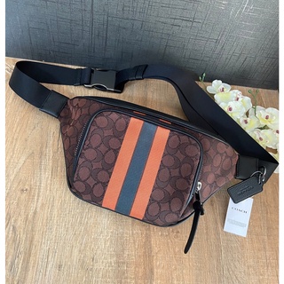 🦋coach แท้🦋คาดอก COACH C5386 THOMPSON BELT BAG IN SIGNATURE JACQUARD WITH VARSITY STRIPE MAHOGANY GUNGER MULTI