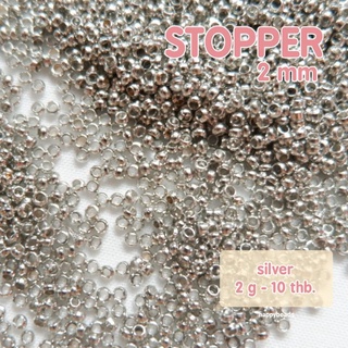 ภาพขนาดย่อของสินค้าStopper ตัวปิดปม 2 mm มี 2 สีให้เลือก - gold/silver (แพค 2 กรัม)