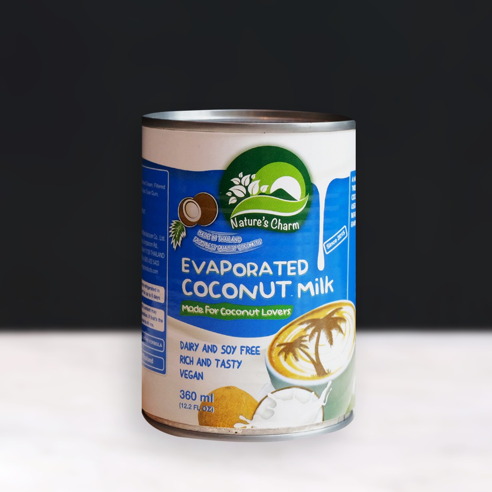 ภาพหน้าปกสินค้านมมะพร้าวข้นจืด Nature's Charm Evaporated Coconut Milk จากร้าน veganerieworld บน Shopee