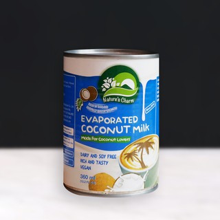 ภาพขนาดย่อของภาพหน้าปกสินค้านมมะพร้าวข้นจืด Nature's Charm Evaporated Coconut Milk จากร้าน veganerieworld บน Shopee