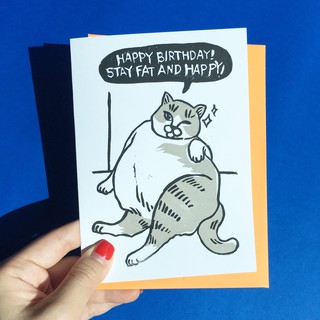 ภาพหน้าปกสินค้าการ์ดวันเกิดน่ารัก การ์ดวันเกิดพร้อมซอง ลายแมว Happy Birthday Stay Fat and Happy แบรนด์ Chonky Goods funny cat birthday ซึ่งคุณอาจชอบราคาและรีวิวของสินค้านี้