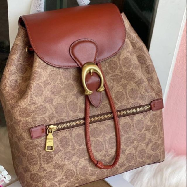 coach evie backpack Women's Zipped Pocket in the front Backpack, Color: Brown : Buy Online at Best Price in KSA Leather backpack Coach Black in