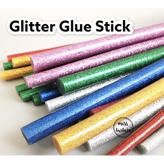 ภาพหน้าปกสินค้าพร้อมส่งในไทย Glitter Glue Sticks กาวแท่งร้อนแบบกลิตเตอร์ สำหรับงาน D.I.Yหลากสีสัน (ราคา/1แท่ง) ที่เกี่ยวข้อง