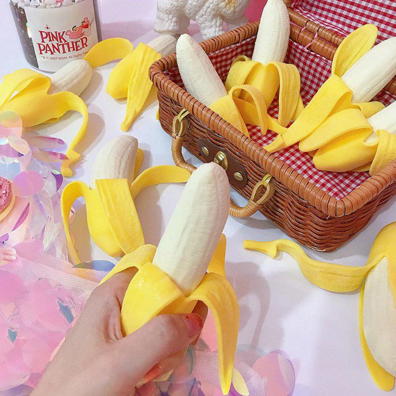 ภาพหน้าปกสินค้าkittyhome ราคาถูกที่สุด ของเล่นสกุชชี่ รูปกล้วย ยืดหยุ่น ที่เกี่ยวข้อง