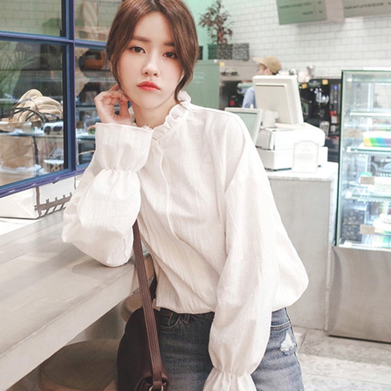 ภาพหน้าปกสินค้าฤดูร้อนใหม่เกาหลีเสื้อเชิ้ตสีขาวแขนยาว - เสื้อหลวมแฟชั่นของผู้หญิง ขายส่ง ผ้าที่สะดวกสบาย