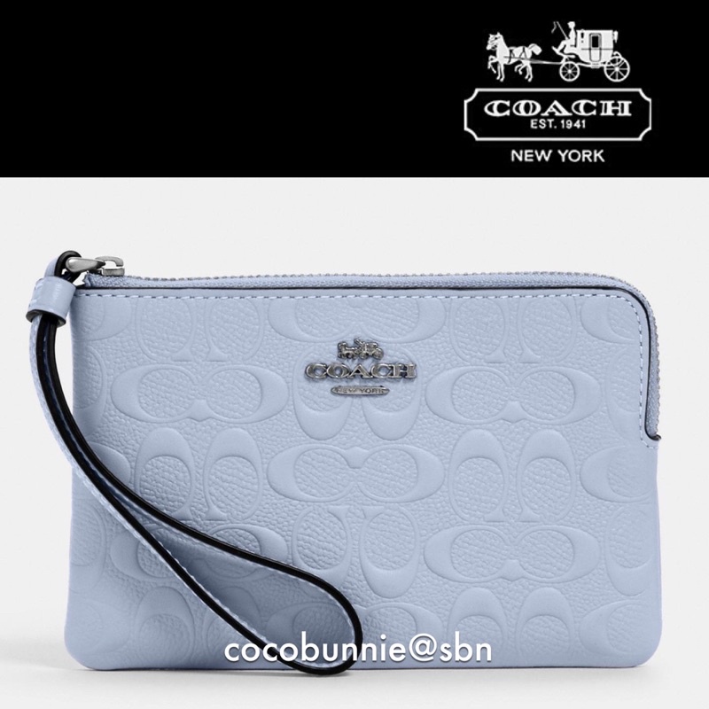 พร้อมส่ง-usa-กระเป๋าคล้องข้อมือ-หนังแท้-coach-corner-zip-wristlet-in-signature-leather-67555-สีฟ้า-อะไล่สีเงิน