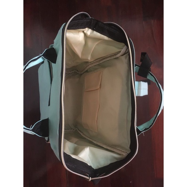 กระเป๋าเป้แฟชั่นสีเขียวมิ้นท์-ยี่ห้อ-living-traveling-share