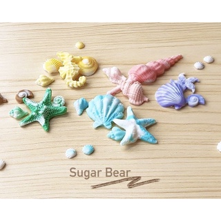 ภาพขนาดย่อของภาพหน้าปกสินค้าน้ำตาลเปลือกหอย ใหญ่-เล็ก คละขนาด 25g น้ำตาลตกแต่งเค้ก จากร้าน sugarbearfactory บน Shopee