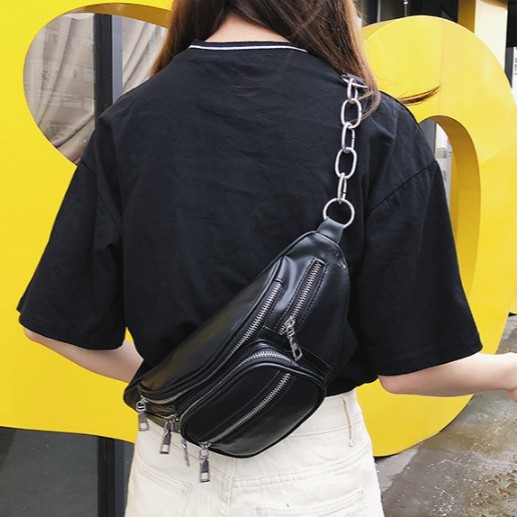 ภาพหน้าปกสินค้า𝑬𝑽𝑬 กระเป๋าสะพายข้างหนังเทียม 4 ช่องซิปสีดำเงา (E-993) จากร้าน hanan1996 บน Shopee
