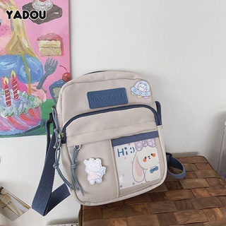 YADOU The New
กระเป๋าสะพายข้าง
สไตล์ญี่ปุ่น
อิน
วินเทจ
หญิงสาวน่ารัก
กระเป๋า messenger นักเรียนบัตรโปร่งใสสร้างสรรค์