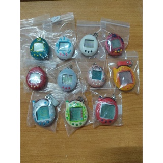 ภาพหน้าปกสินค้าทามาก็อตจิ tamagotchi แท้ เทสแล้ว เล่นได้ปกติ ที่เกี่ยวข้อง