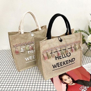 ภาพหน้าปกสินค้า#OK0042 กระเป๋าผ้ากระสอบ พู่ห้อย HELLO WEEKEND ที่เกี่ยวข้อง