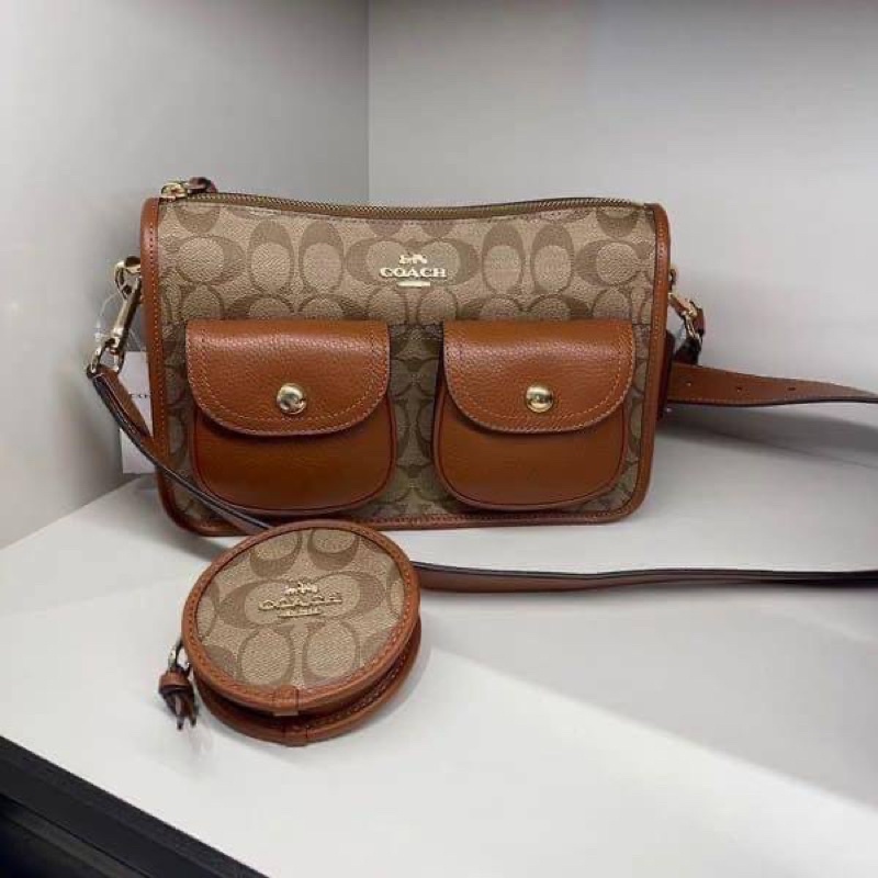Coach Pennie Crossbody with Coin Case in Signature Canvas Darkbrown,  Women's Fashion, Bags & Wallets, Cross-body Bags on Carousell