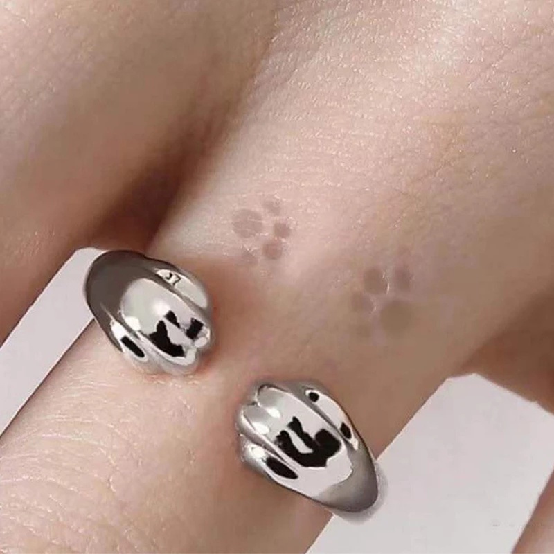 ภาพหน้าปกสินค้าแหวนแฟชั่น แบบเปิด พิมพ์ลายอุ้งเท้าแมวน่ารัก ของขวัญวันเกิด สําหรับผู้หญิง