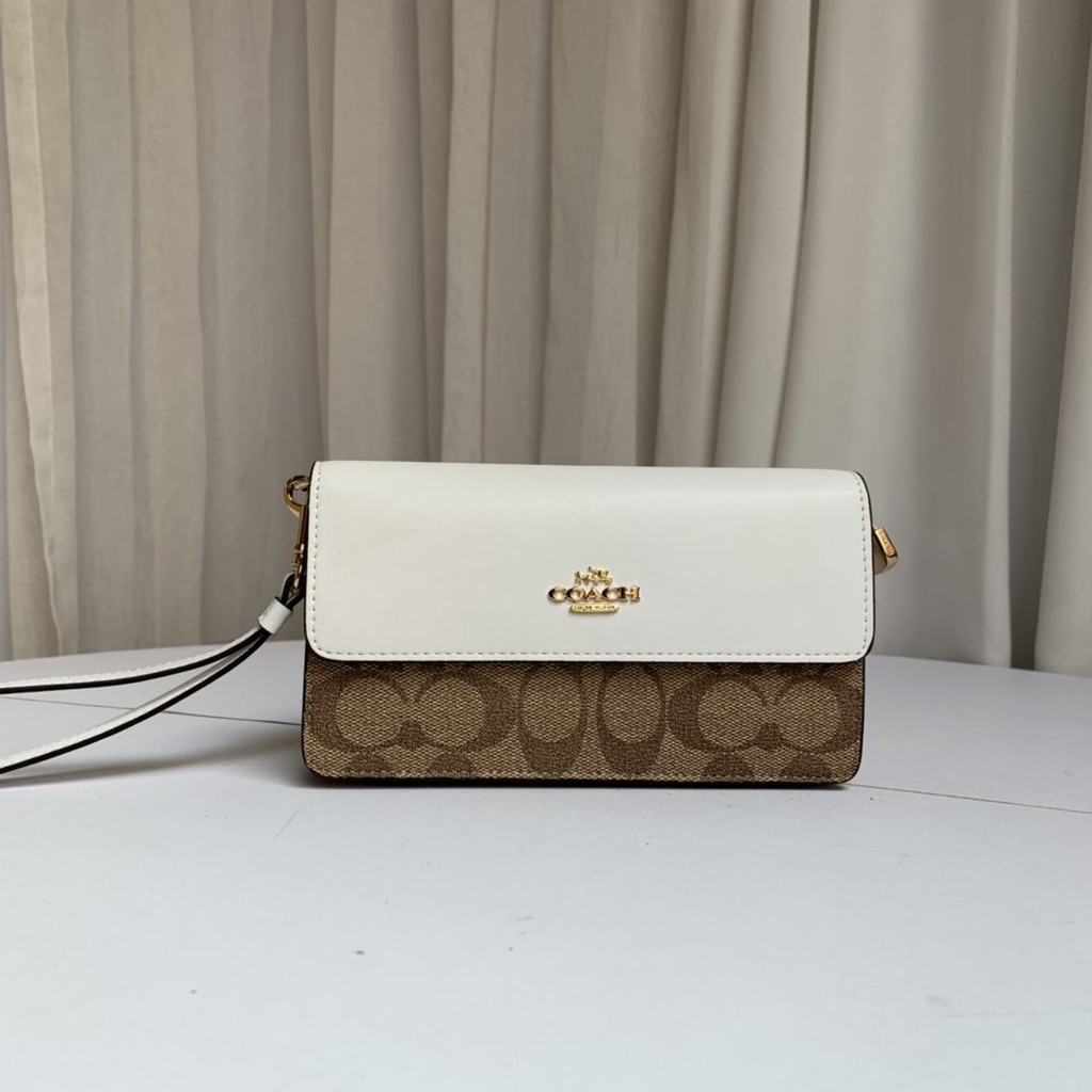 พร้อมส่ง-แท้-100-new-coach-กระเป๋าสตางค์-รุ่น-foldover-wristlet-in-signature-canvas-coach-f78229