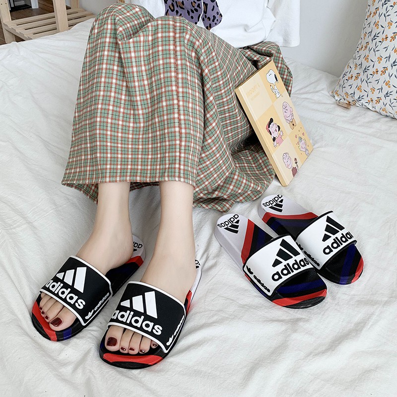 ภาพหน้าปกสินค้าAdidas รองเท้าแตะชาย Kawa Slides พื้นนิ่ม แท้ % จากช้อปสีดำ 1688-2 จากร้าน sandals_tt บน Shopee