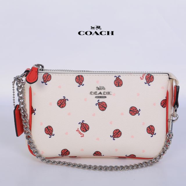 กระเป๋า-coach-handle-pouch-signature-ladybug-print