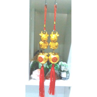 วัวทองด้ายแดงเหรียญเงิน  ชว่ยหนุนนำดวงชะตาไห้มีโชคลาภเงินทอง  มีความอุดมสมบูรณ์