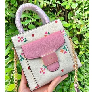 COACH MINI PEPPER CROSSBODY WITH HEART PETAL PRINT