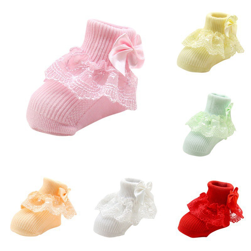 ภาพหน้าปกสินค้าBABYWORLD ถุงเท้าผ้าฝ้าย ผูกโบว์ สำหรับเด็กทารกวัย 0-12 เดือน
