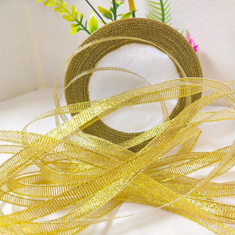 ริบบิ้นผ้าสีทอง-ริบบิ้นเนื้อทรายสีทอง-และสีเงิน-1ม้วน
