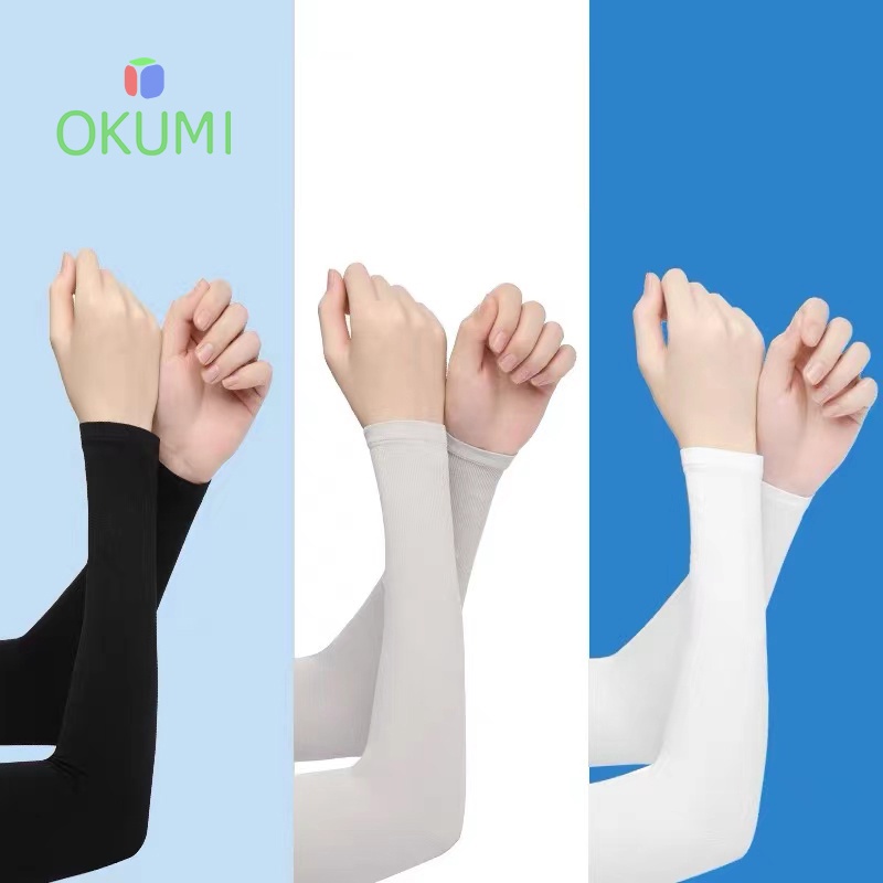 ภาพหน้าปกสินค้าOKUMI_SHOP ปลอกแขนกันแดด ปลอกแขนกันกันแสง UV ใส่ได้ทั้งชายและหญิง เนื้อผ้านุ่ม