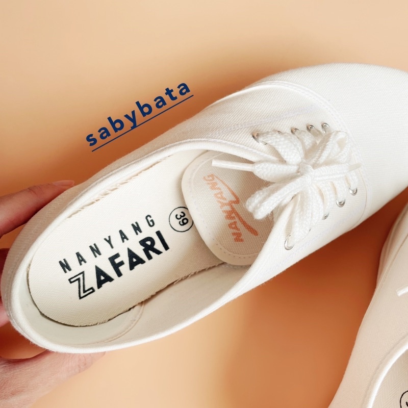 ภาพหน้าปกสินค้ารองเท้า ผ้าใบ นันยาง ซาฟารี รองเท้าขาว ผ้าใบขาว มีไซส์ 35-45 unisex ใส่ได้ทั้งญ ช nanyang zafari safari จากร้าน sabybata บน Shopee