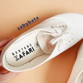 ภาพขนาดย่อของภาพหน้าปกสินค้ารองเท้า ผ้าใบ นันยาง ซาฟารี รองเท้าขาว ผ้าใบขาว มีไซส์ 35-45 unisex ใส่ได้ทั้งญ ช nanyang zafari safari จากร้าน sabybata บน Shopee