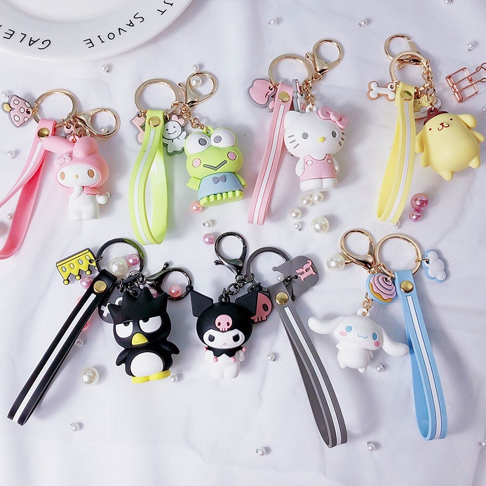 ภาพหน้าปกสินค้าพวงกุญแจ การ์ตูน Melody Hello Kitty Kuromi Pudding dog สร้างสรรค์ พวงกุญแจสเตอริโอ