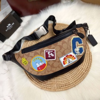 COACH X PEANUTS WARREN BELT BAG IN SIGNATURE CANVAS WITH VARSITY PATCHES