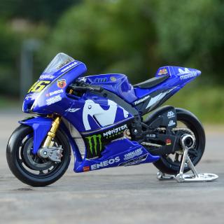 ภาพหน้าปกสินค้าMaisto 1:18 2018 MotoGP Racing Yamaha YZR M1 #46 #25 รถหล่อแบบคงที่โมเดลรถจักรยานยนต์ของเล่นงานอดิเรกของสะสม ที่เกี่ยวข้อง