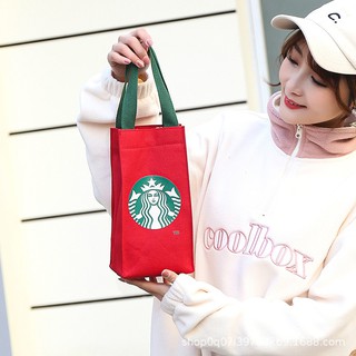 ภาพหน้าปกสินค้าStarbucks กระเป๋าผ้าแคนวาส กระเป๋าใส่แก้วน้ํา แบบพกพา สําหรับคุณแม่ ที่เกี่ยวข้อง