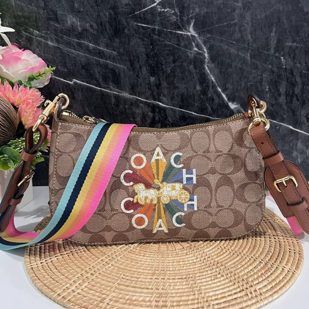 coach-jes-baguette-in-signature-canvas-with-coach-radial-rainbow-coach-c6817