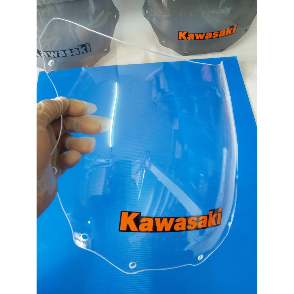บังไมล์-ชิวหน้า-kawasaki-zx-150cc-แบบใส-หนา-เหนียว-สติกเกอร์สีส้ม