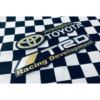 ภาพหน้าปกสินค้าสติ๊กเกอร์ TRD Toyota Racing JDM สติกเกอร์ สีทอง [2ชิ้น] Car Foil Stickers 3D ตัวนูน แต่งรถ ติดรถ ติดกระจก ท้ายรถ รถยนต์ ที่เกี่ยวข้อง