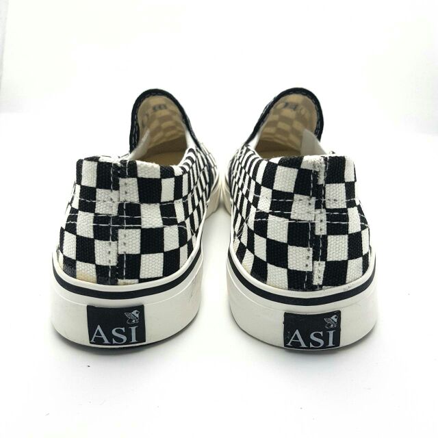 ภาพหน้าปกสินค้ารองเท้าผ้าใบสวม ลายสก็อตดำ ASI ไซส์ 38-45 จากร้าน i_am_shoes บน Shopee