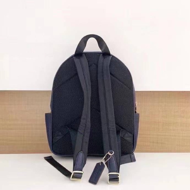 coach-denim-court-backpack