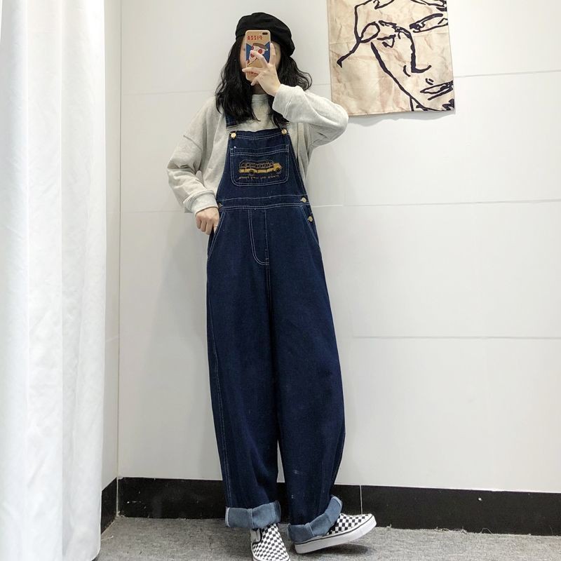 ภาพหน้าปกสินค้าแฟชั่นสไตล์เกาหลี ins เอี๊ยมกางเกงยีนส์หลวมตรงขากว้างสำหรับสาว ๆ จากร้าน 1inu4yoecf14_kewm10m7n0v9no5 บน Shopee