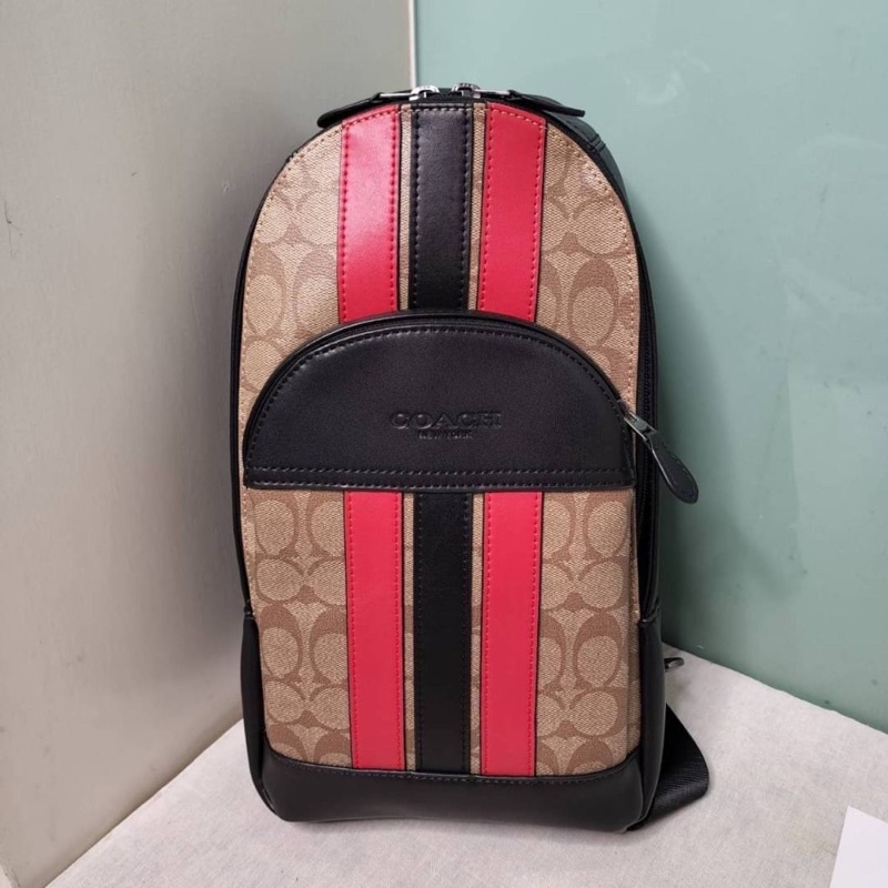 coach-f85035-houston-pack-in-signature-canvas-with-varsity-stripe-qb-tan-soft-red-black