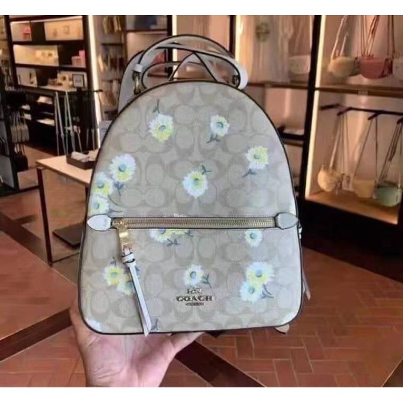 coach-jordyn-backpack-in-signature-canvas-with-prairie-daisy-cluster-print-coach-3054