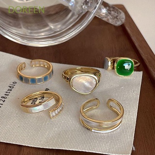 Doreen แหวนนิ้วมือ ประดับคริสตัล แบบกลวง ปรับขนาดได้ สไตล์เกาหลี วินเทจ เรียบง่าย ของขวัญ สําหรับผู้หญิง
