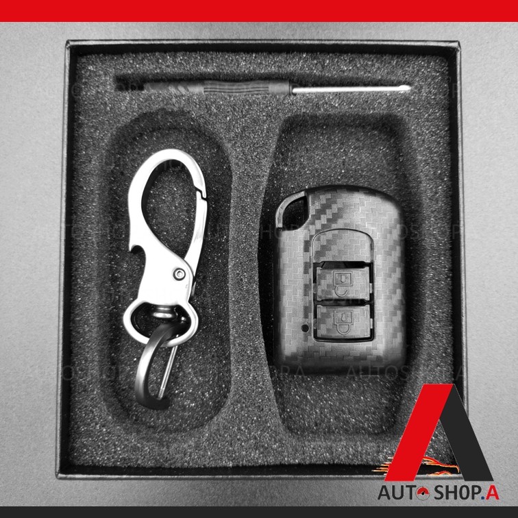 ภาพหน้าปกสินค้ากรอบ เคฟล่า เคสกุญแจรถ ปลอกกุญแจ รถยนต์ Mitsubishi รุ่นรีโมทพร้อมดอกกุญแจ Mirage มิราจ , Attrage 2ปุ่ม
