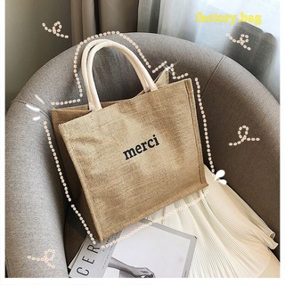 ภาพขนาดย่อของภาพหน้าปกสินค้าOK0013 กระเป๋าถือ merci จากร้าน factory.bag บน Shopee