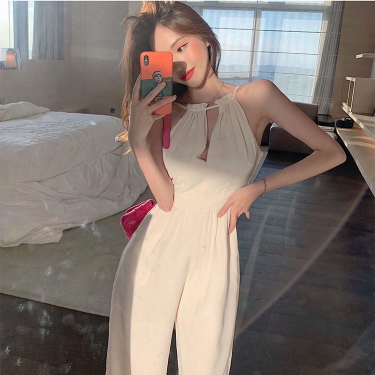 020523-hot-sale-ฤดูร้อน2022-jumpsuit-กลวงสีขาวชุดใหม่อารมณ์ที่ไม่มีสายหนังแขนกุดแขวนคอเสื้อหญิงเอวสูงกางเกงขากว้าง